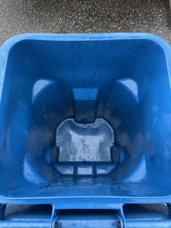 A blue wheelie bin cleaned inside and out