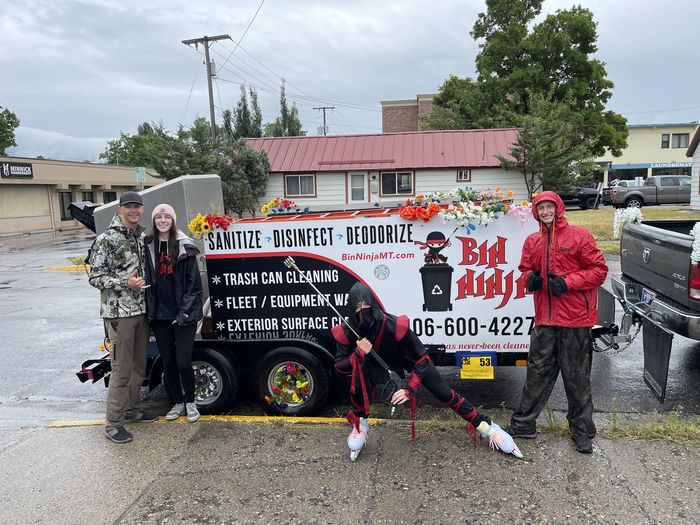 The Bin Ninja crew with the trailer on a wet day