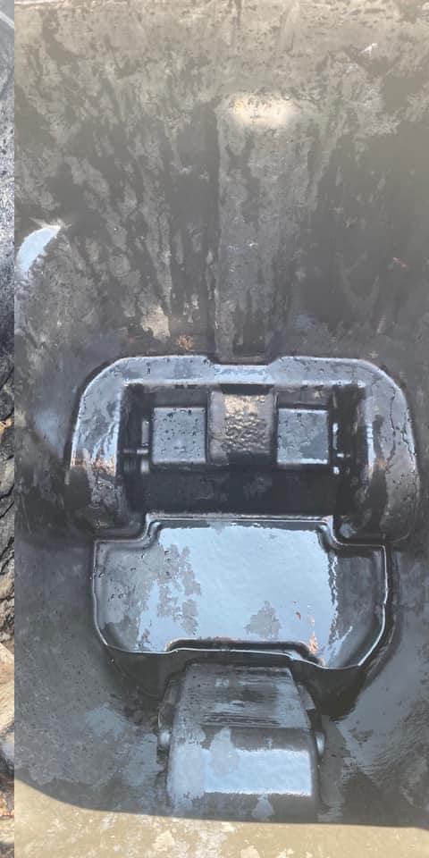 The same dumpster interior after hot-water cleaning